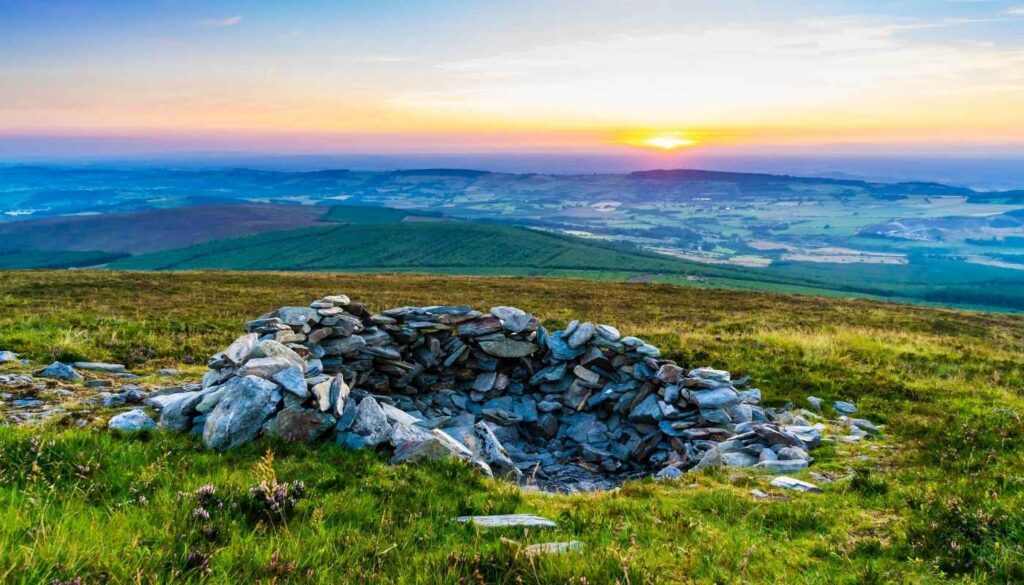 Panoramic view across Wicklow Mountains National Park with rolling hills and scenic Irish countryside
