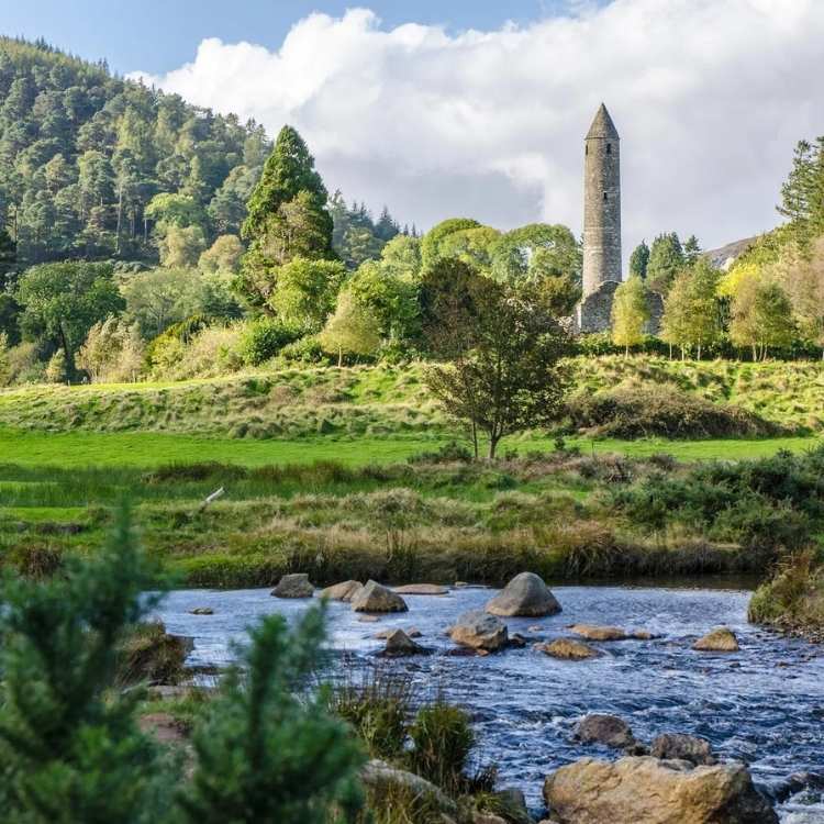 Glendalough Round Tower and monastic site in the Wicklow Mountains on a private Wicklow tour.